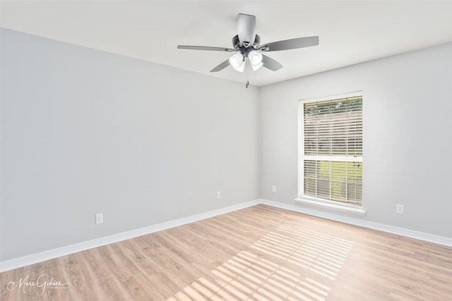 9756 Amblewood Ln, Shreveport, LA 71118 - empty room with light wood finished floors, baseboards, and ceiling fan