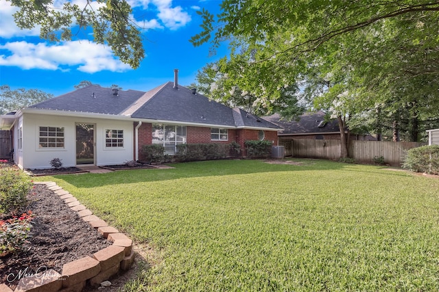 9756 Amblewood Ln, Shreveport, LA 71118 - back of property featuring roof with shingles, cooling unit, and brick siding