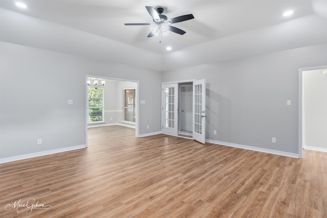 9756 Amblewood Ln, Shreveport, LA 71118 - unfurnished room featuring light wood-style flooring, a ceiling fan, a chandelier, baseboards, and recessed lighting