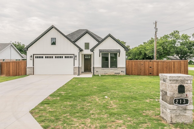213 S Hitt St, Boyd, TX 76023 - view of front of property featuring concrete driveway, board and batten siding, and a garage