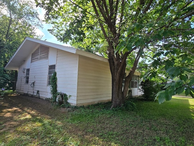 910 S Mills Dr, Euless, TX 76040 - view of side of home with a lawn