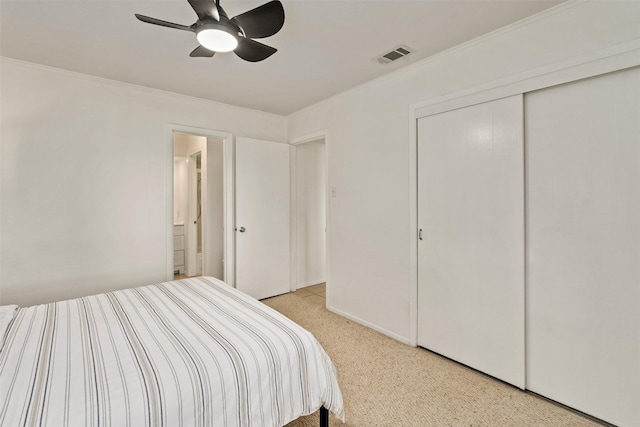 104 Kingsway, Tool, TX 75143 - bedroom featuring a closet, crown molding, light carpet, and a ceiling fan