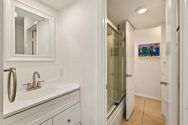 104 Kingsway, Tool, TX 75143 - full bathroom with vanity, tile patterned flooring, and bath / shower combo with glass door