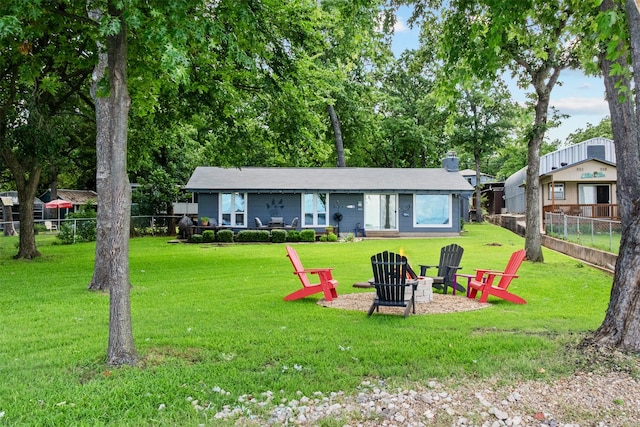 104 Kingsway, Tool, TX 75143 - rear view of house with a fire pit