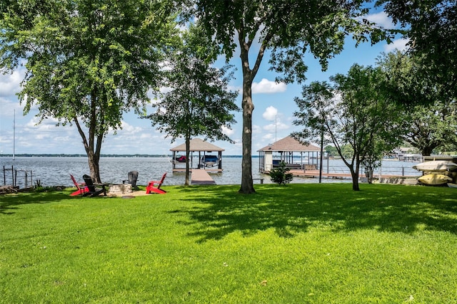 104 Kingsway, Tool, TX 75143 - view of green lawn with boat lift, a boat dock, a water view, and a gazebo