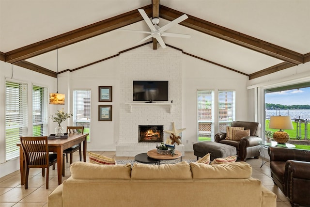 104 Kingsway, Tool, TX 75143 - living room featuring light tile patterned floors, ceiling fan, and a brick fireplace