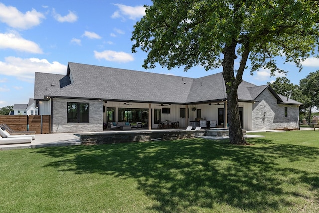7799 Barber Ranch Rd, Fort Worth, TX 76126 - rear view of property with ceiling fan, board and batten siding, outdoor lounge area, a patio, and roof with shingles