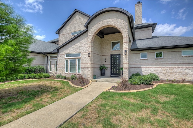 18133 Grandview Dr, Forney, TX 75126 - french provincial home featuring a chimney, a front lawn, and stone siding