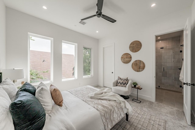 5320 Reiger Ave Unit 101, Dallas, TX 75214 - bedroom featuring recessed lighting, light carpet, baseboards, light tile patterned flooring, and ensuite bathroom