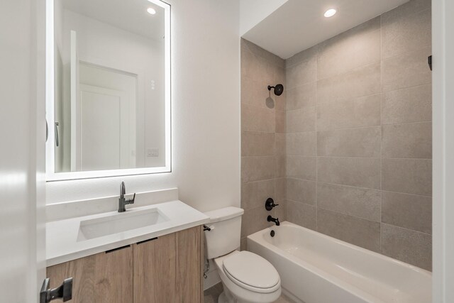 5320 Reiger Ave Unit 101, Dallas, TX 75214 - bathroom with toilet, vanity, bathing tub / shower combination, and recessed lighting