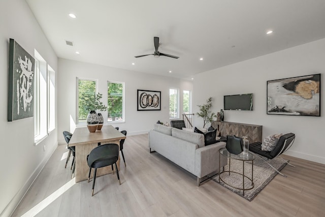5320 Reiger Ave Unit 101, Dallas, TX 75214 - living room with a ceiling fan, light wood-style floors, recessed lighting, and baseboards