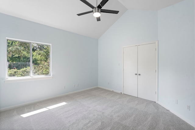 8907 Club Creek Cir, Dallas, TX 75238 - unfurnished bedroom featuring carpet floors, ceiling fan, a closet, and high vaulted ceiling