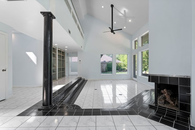 8907 Club Creek Cir, Dallas, TX 75238 - unfurnished living room featuring marble finish flooring, healthy amount of natural light, a ceiling fan, recessed lighting, and high vaulted ceiling