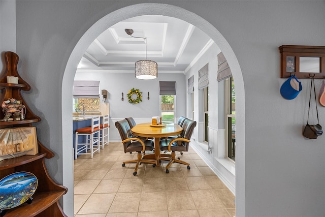 120 Hollie Dr, Red Oak, TX 75154 - dining space with arched walkways, a tray ceiling, ornamental molding, and light tile patterned flooring