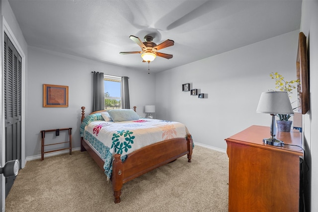 120 Hollie Dr, Red Oak, TX 75154 - bedroom with light carpet, baseboards, a closet, and a ceiling fan