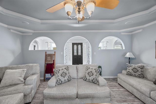 120 Hollie Dr, Red Oak, TX 75154 - living room with ceiling fan, wood finished floors, a raised ceiling, crown molding, and baseboards