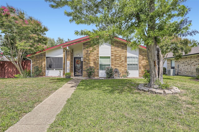 3114 Fairgate Dr, Carrollton, TX 75007 - mid-century inspired home featuring cooling unit and brick siding