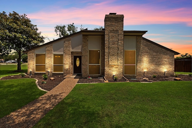 1614 Shadow Moss Way, Carrollton, TX 75007 - mid-century modern home featuring a chimney and a front lawn