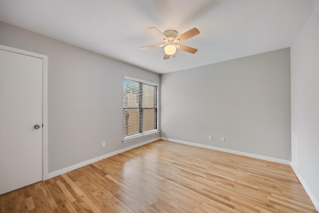 3121 Park Ln Unit 1103, Dallas, TX 75220 - unfurnished room with ceiling fan, light wood finished floors, and baseboards