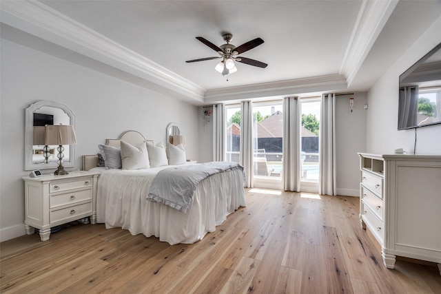 3916 Boulton Ct, Plano, TX 75025 - bedroom with crown molding, a raised ceiling, light wood-style floors, access to exterior, and baseboards