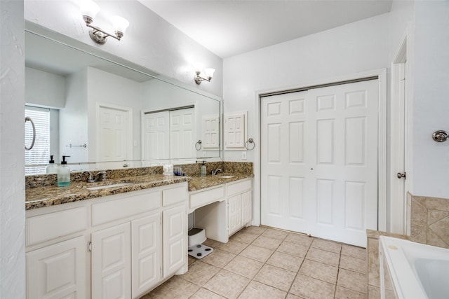 3916 Boulton Ct, Plano, TX 75025 - full bath with double vanity, tiled tub, and tile patterned floors