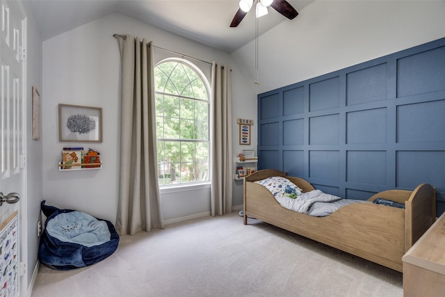 3916 Boulton Ct, Plano, TX 75025 - bedroom featuring vaulted ceiling, light colored carpet, multiple windows, a ceiling fan, and a decorative wall