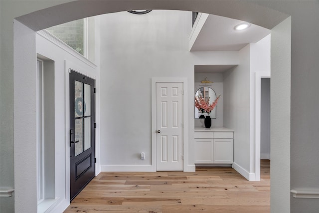 3916 Boulton Ct, Plano, TX 75025 - foyer with light wood finished floors and baseboards