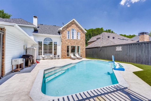 3916 Boulton Ct, Plano, TX 75025 - view of swimming pool featuring a patio area and a fenced backyard
