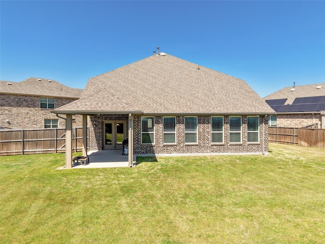 2400 Prairie Trail Ave, Aubrey, TX 76227 - rear view of property featuring roof with shingles, a patio, and brick siding
