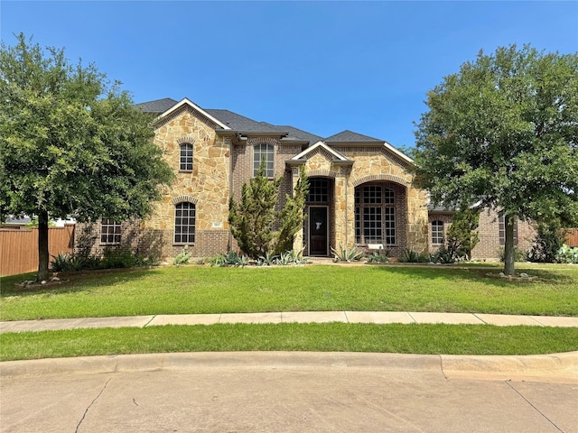 1801 Monaco Dr, Corinth, TX 76210 - french country style house featuring stone siding