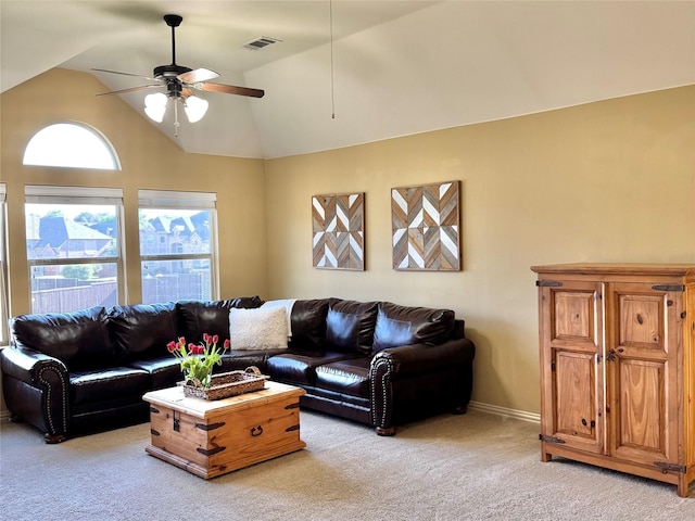 1801 Monaco Dr, Corinth, TX 76210 - living room featuring a ceiling fan, light colored carpet, vaulted ceiling, and baseboards