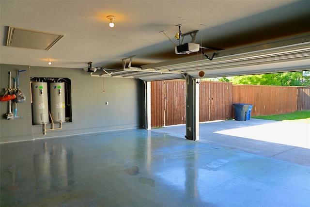 1801 Monaco Dr, Corinth, TX 76210 - garage featuring electric water heater and a garage door opener
