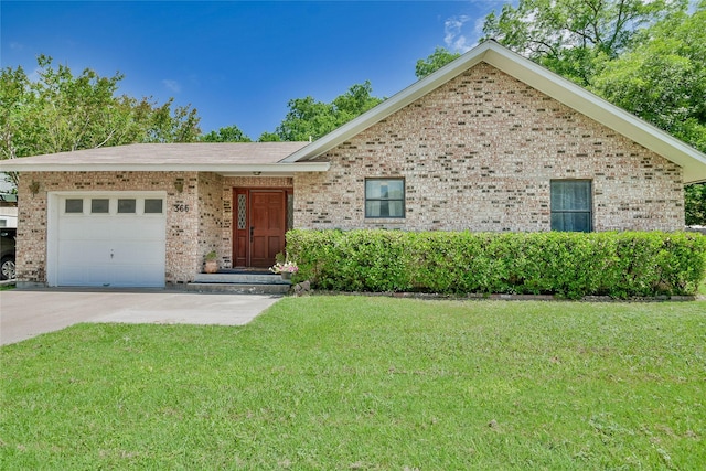 366 W Blackjack St, Dublin, TX 76446 - ranch-style home featuring an attached garage, a front lawn, brick siding, and driveway