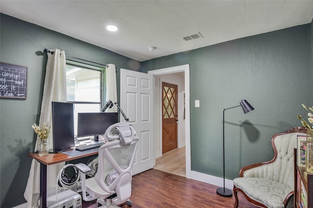 366 W Blackjack St, Dublin, TX 76446 - office space with wood finished floors, baseboards, a textured wall, and a textured ceiling