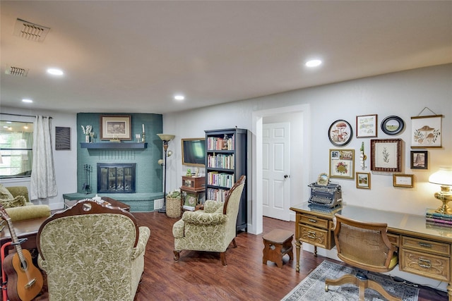 366 W Blackjack St, Dublin, TX 76446 - office with a brick fireplace, wood finished floors, and recessed lighting