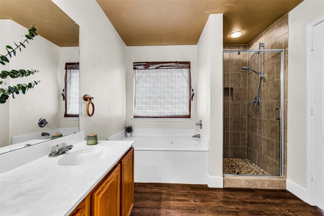 432 Maplegrove Rd, Cedar Hill, TX 75104 - bathroom with a garden tub, a shower stall, vanity, and wood finished floors
