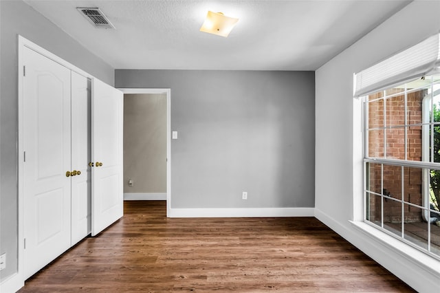 432 Maplegrove Rd, Cedar Hill, TX 75104 - unfurnished bedroom featuring wood finished floors and baseboards