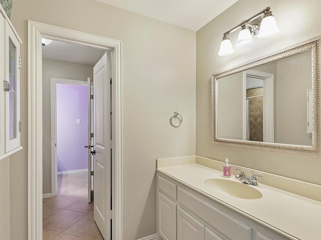 701 Buffalo Springs Dr, Prosper, TX 75078 - bathroom with vanity, tile patterned flooring, and baseboards