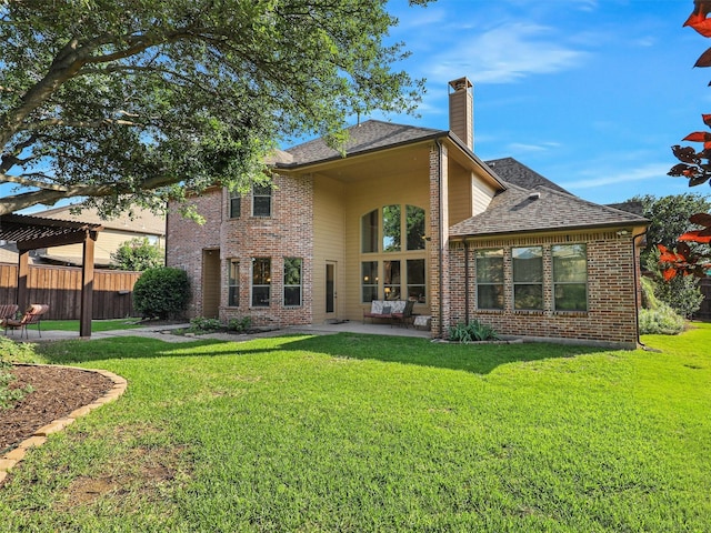 701 Buffalo Springs Dr, Prosper, TX 75078 - back of house featuring a patio area, a chimney, brick siding, and roof with shingles