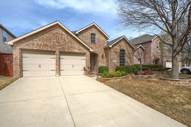 10520 Sexton Dr, Mckinney, TX 75072 - traditional-style house featuring brick siding, an attached garage, and concrete driveway
