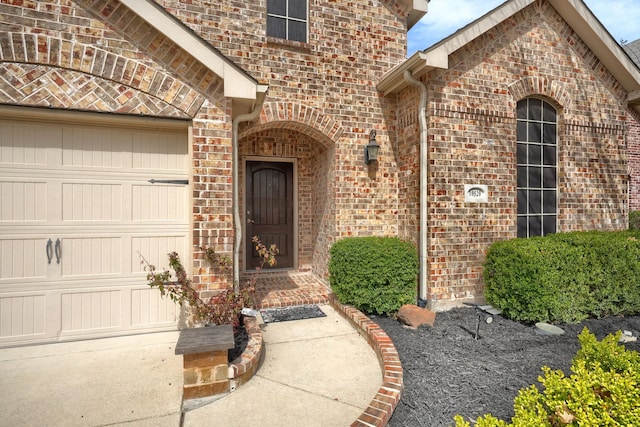 10520 Sexton Dr, Mckinney, TX 75072 - view of exterior entry featuring brick siding
