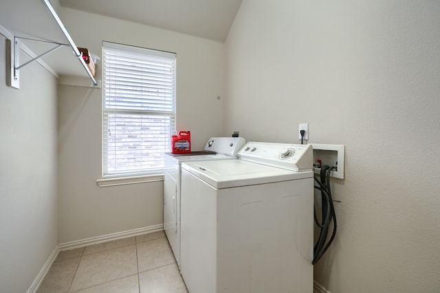 10520 Sexton Dr, Mckinney, TX 75072 - laundry area featuring independent washer and dryer, baseboards, and light tile patterned flooring