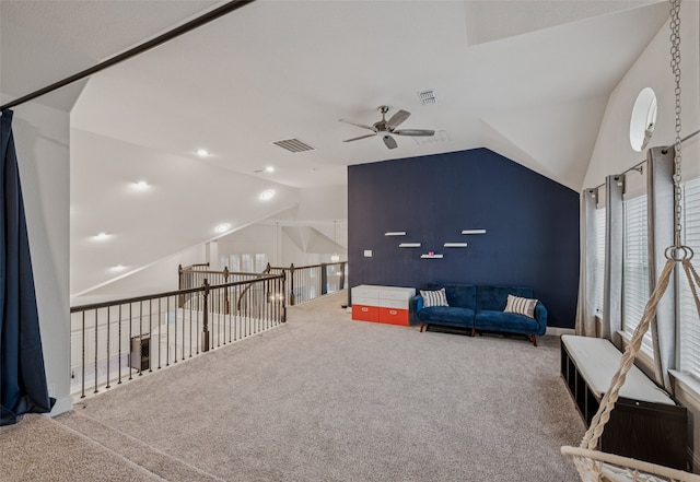 3909 Shrike Trl, Fort Worth, TX 76262 - living area featuring a ceiling fan, vaulted ceiling, carpet flooring, and plenty of natural light