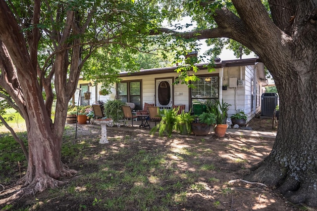 201 S Lake Dallas Dr, Lake Dallas, TX 75065 - single story home with a porch, central AC, and a chimney