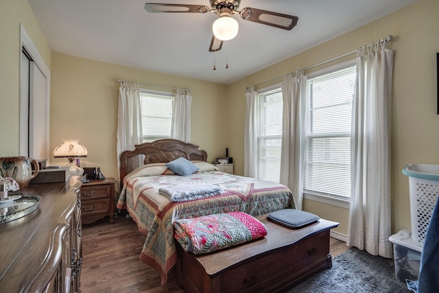 201 S Lake Dallas Dr, Lake Dallas, TX 75065 - bedroom featuring dark wood-style floors, a closet, and ceiling fan