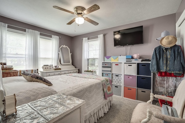 201 S Lake Dallas Dr, Lake Dallas, TX 75065 - carpeted bedroom featuring a ceiling fan