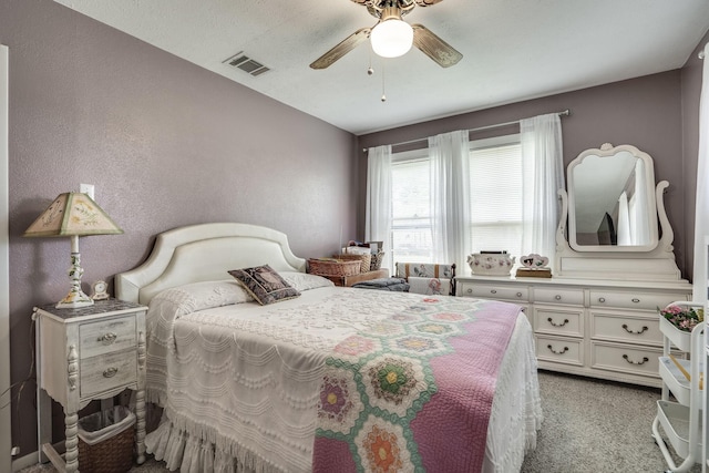201 S Lake Dallas Dr, Lake Dallas, TX 75065 - bedroom featuring light colored carpet and ceiling fan