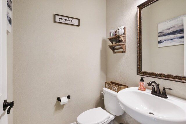 104 Laurel Oak Dr, Red Oak, TX 75154 - half bathroom with a sink and toilet
