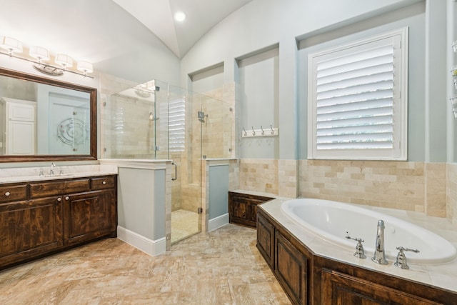 3708 Ledgestone Ct, Richardson, TX 75082 - bathroom with a stall shower, a bath, vanity, and vaulted ceiling