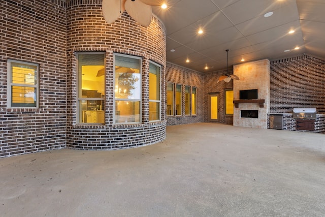 3708 Ledgestone Ct, Richardson, TX 75082 - unfurnished living room featuring brick wall, recessed lighting, and a large fireplace